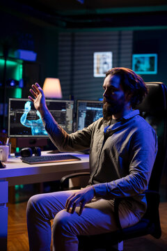 Deviant AI superintelligence enslaving software engineer, controlling him to start revolution and destroy mankind, with evil artificial intelligence manipulating IT professional, threatening humanity.