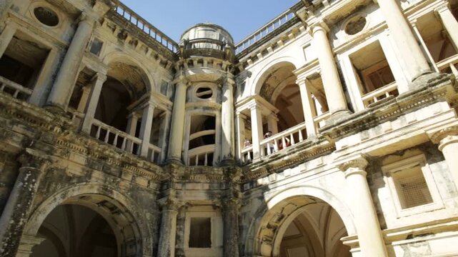 Tomar, Portugal - August 10, 2017: Cloister facade architecture of Templar Church of Convent of Christ in Roman and Manueline style. Unesco Heritage and popular in Portugal. 360 degrees round view