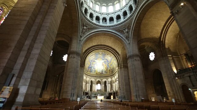 Paris, France - July 3, 2017: central nave colonnade of Sacre Coeur Montmartre Gothic cathedral of Paris. Interior of the Church.