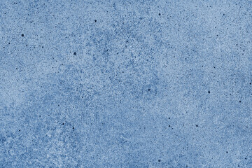 Obraz premium Abstract grunge concrete texture background with different shades of blue color. Painted canvas, stucco rock surface, studio backdrop, grainy effect, distressed surface and fine speckled details
