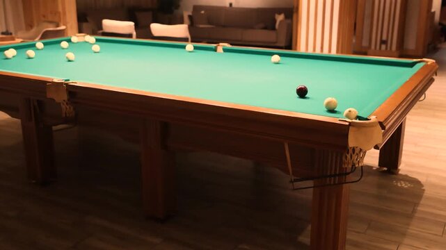 Luxury pool hall interior with billiard table green cloth and balls