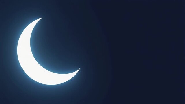 Glowing crescent moon isolated on a dark blue night sky background.
