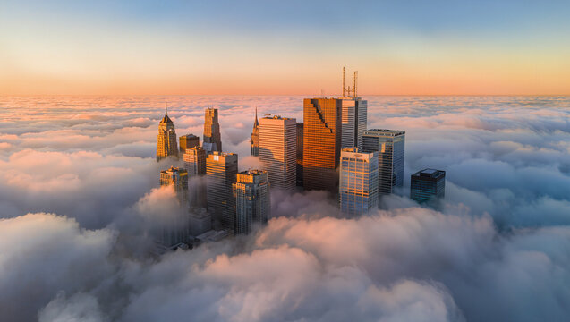 Stunning Chicago Skyline Above Cloud Layer at Golden Hour