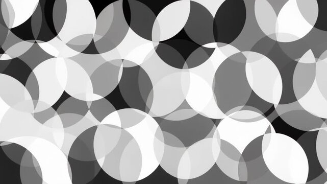 Abstract Circles Background: A mesmerizing pattern of overlapping circles in shades of grey, creating a sense of depth and modern design.