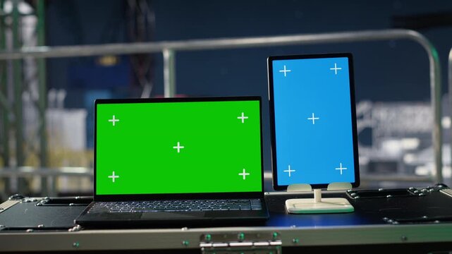 Green screen mockup devices on offshore platform monitor petrol logistics during maritime blockage while chroma key laptop and tablet used to evaluate oil drilling performance during fuel crisis.