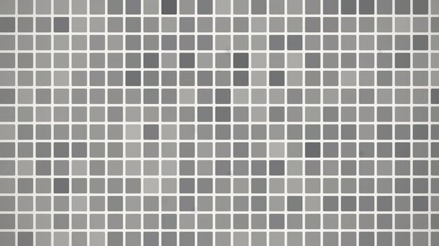 Seamless 4K loop of a silver wall of glowing tiles lighting up in waves in rich volumetric light. Ideal for software background, technology background. 4K UHD.
