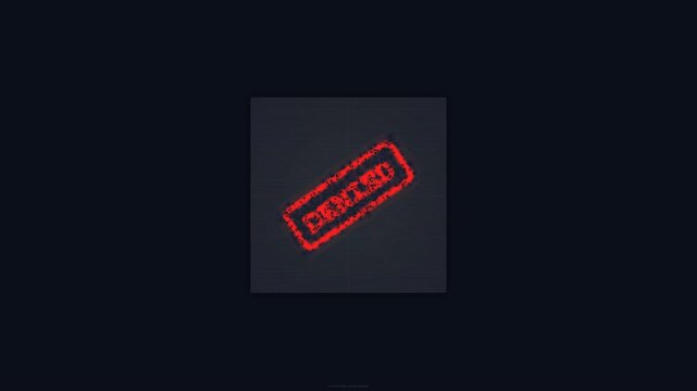 A close-up shot of a red checked stamp on a dark gray background