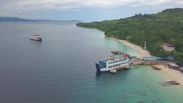 Aerial View of Passenger Ferry Boat Docked at Tropical Island Harbor Terminal