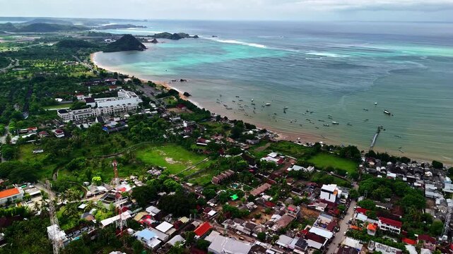 Aerial panorama of Kuta Beach in Lombok, with its tropical coastline and village