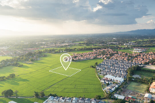Land plot in Chiang Mai, Thailand with GPS location pin and highlighted parcel boundary. Real estate concept representing land plot for sale, land surveying, cadastral mapping, title deed issuance.