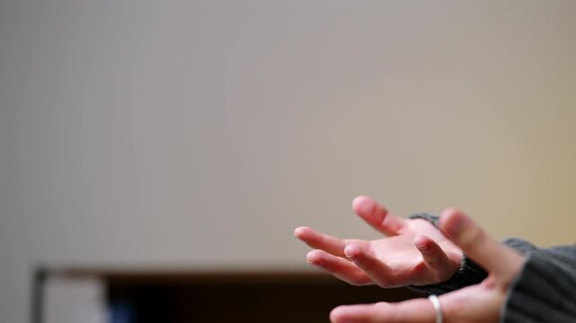 Close up of Person Hands Making Explaining Gesture with Copy Space