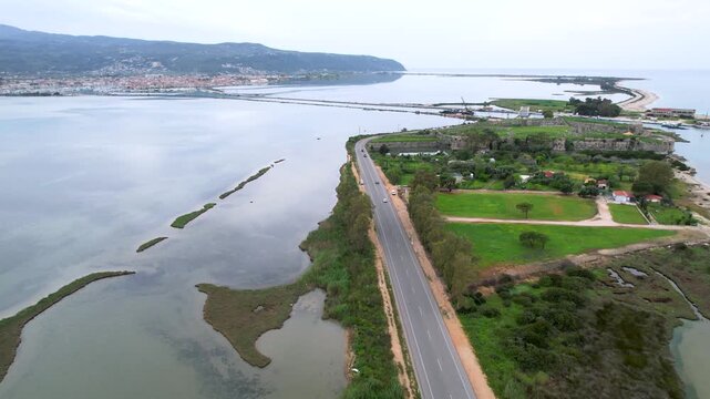 Road to Lefkada Ionian Sea Greece, Island in Eftanisa Connected by Road, Aerial Dolly Shot Showing Agia Mavara Fortress and City Center in Background