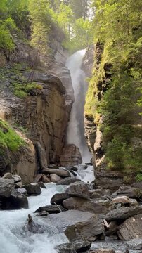 Rosenlauifall waterfall on the alpine stream Reichenbach, Switzerland - Wasserfall Rosenlauifall am Alpenbach Reichenbach, Schweiz