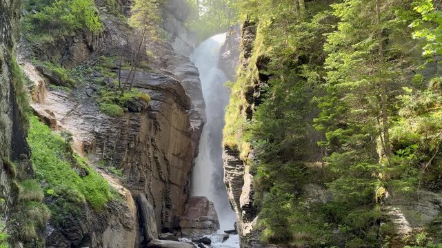 Rosenlauifall waterfall on the alpine stream Reichenbach, Switzerland - Wasserfall Rosenlauifall am Alpenbach Reichenbach, Schweiz
