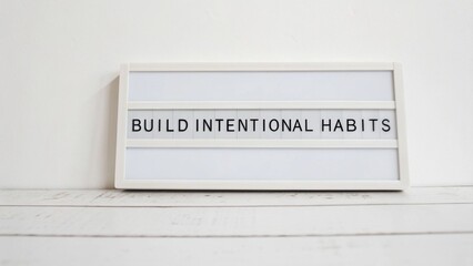 Obraz premium Inspirational sign encouraging personal growth, focus on building intentional habits for self-improvement and daily motivation