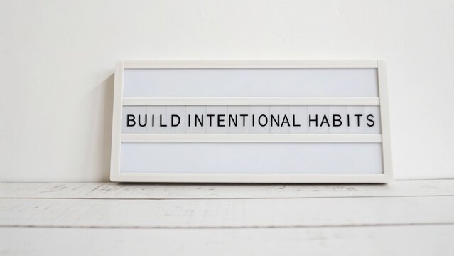 Inspirational sign encouraging personal growth, focus on building intentional habits for self-improvement and daily motivation