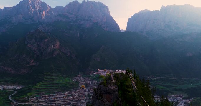 Aerial view of Tibetan village in Zhagana, Gannan, Gansu, natural scenery in mountain valley