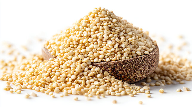 Heap of raw quinoa grains spilled from a wooden bowl with nutrition, superfood