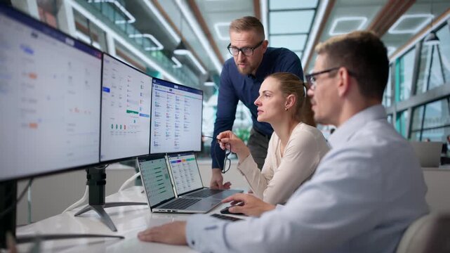 Human Resources Manager Reviewing Payroll Software