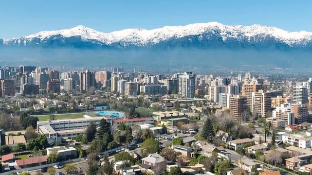 Santiago, Chile. Aerial view with the Andes mountain range in the background. Mountain range and snow-capped mountains.