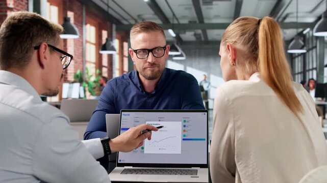 Payroll Manager And Team Discuss Software
