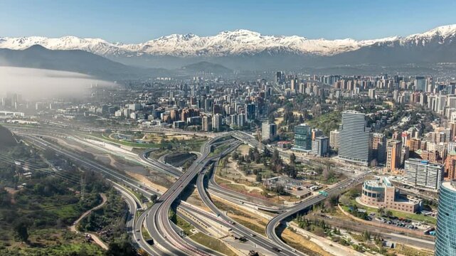 Santiago, Chile. Aerial view with the Andes mountain range in the background. Mountain range and snow-capped mountains.