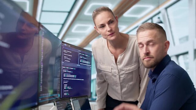 Software Engineers Collaborate Closely On Coding Secure Business Applications