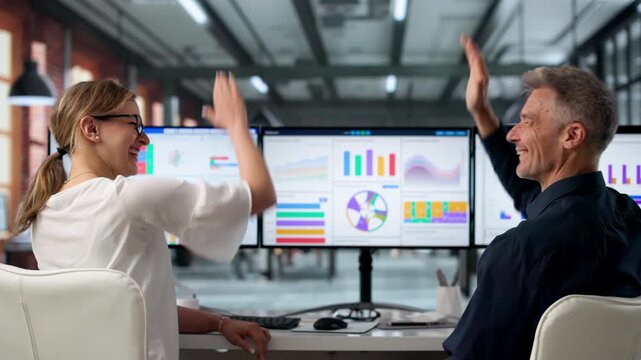 Financial Analysts Celebrate Reaching Key Performance Goals