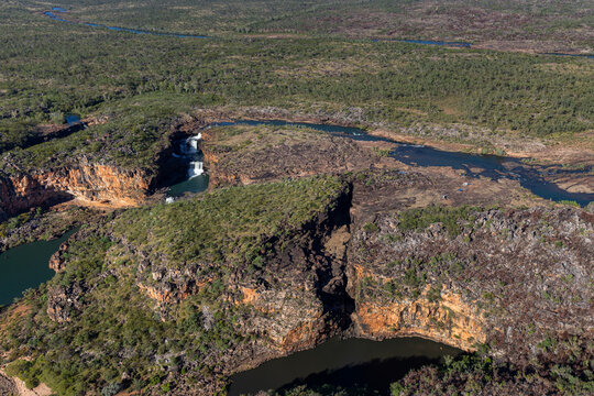 Aerial view of the Mitchell River and the Mitchell River Falls as the decend from the Mitchell Plateau in the Mitchell River National Park.
