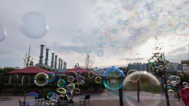 Colorful Soap Bubbles Floating in Air Outdoors