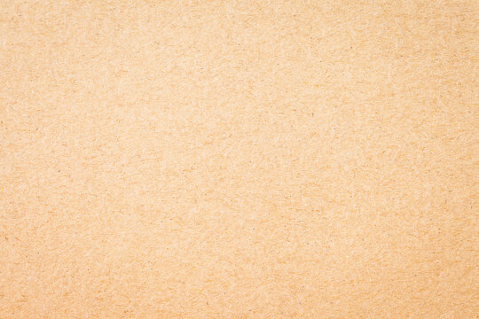 Brown kraft paper texture background, recycled paper sheet for design.
