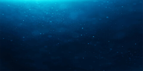 Deep blue ocean water with tiny bubbles rising towards the surface, creating a serene and mysterious underwater ambiance. © QUALITY BOOST