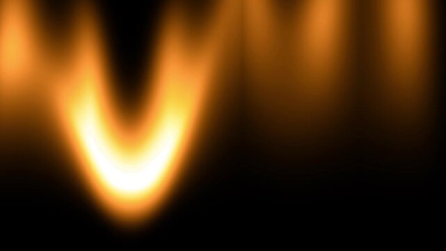 A smooth warm golden gradient glow effect fading from bright amber to dark creating a soft fire light or sunset background texture