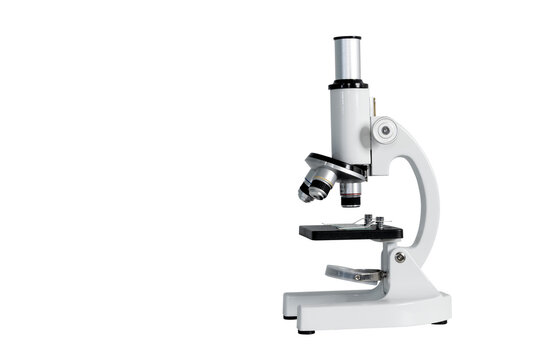 Classic microscope isolated on a clean light background with ample copy space, suitable for concepts related to laboratory research medical education, biology study, scientific analysis. Clipping path