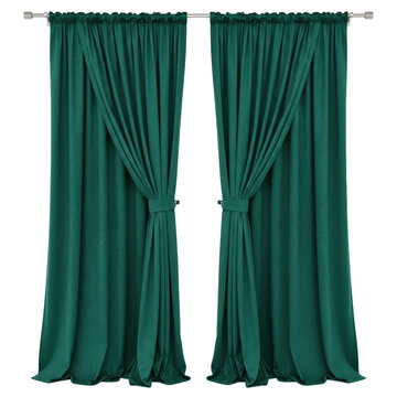 Two elegant emerald green velvet curtains with soft folds pulled back on a silver rod against a solid white studio background luxury interior design concept
