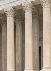 Obraz premium Columns marble fluted Tall vertical. Columns architectural symmetry repetition. Columns decorative capitals ornament elements. Columns classical facade.
