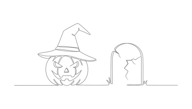 Halloween pumpkin in witch hat next to tombstone