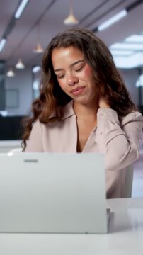 Woman Sitting In Office Chair With Bad Posture Feeling Neck