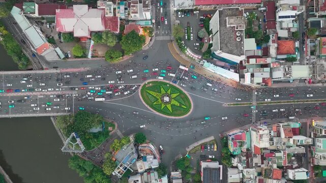 Top down aerial view of Dien Bien Phu roundabout traffic in Ho Chi Minh City Vietnam
