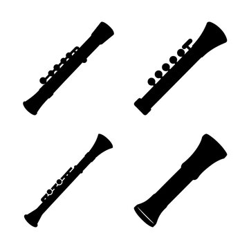 Four black musical wind instruments set - Minimalist vector icons of four black wind instruments including clarinet, saxophone, flute, and oboe arranged neatly.