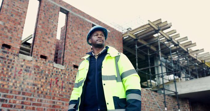 Construction, man and building inspection outdoor for masonry safety, progress and compliance. Civil engineer, black person or monitor development for defect management, quality control and low angle
