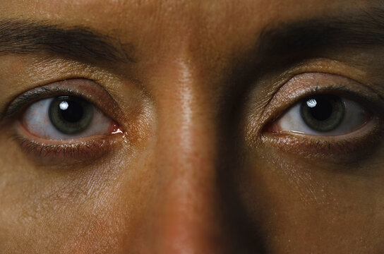 Close up of human eyes looking at camera with serious expression