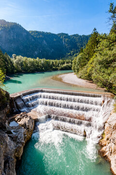 Turquoise water at the Lechfall weir in Bavaria outdoors