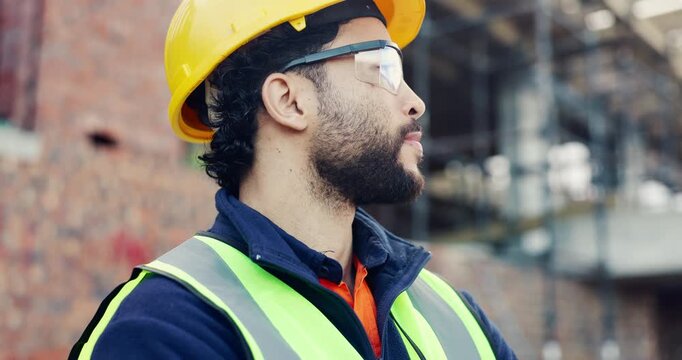 Construction, man and goggles with building inspection for compliance, progress or masonry approval. Outdoor, foreman and monitor development for renovation project, quality assurance and site safety