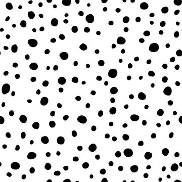 Vector seamless pattern with hand drawn polka dots. Cute design for textile, backgrounds, wallpaper, wrapping paper, digital prints.