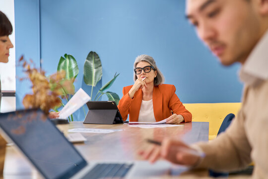 Managers concentrating during a meeting at the startup office