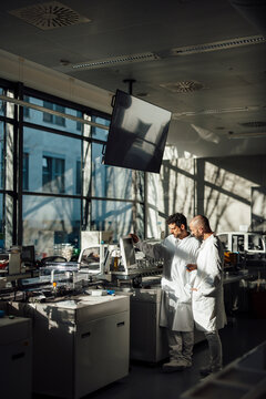 Scientist analyzing research data on modern laboratory screen