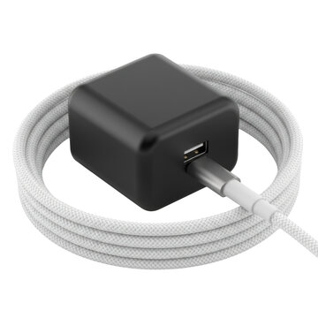 Sleek matte black usb adapter connected to a white coiled charging cable on a transparent background, minimalist industrial design and modern technological efficiency
