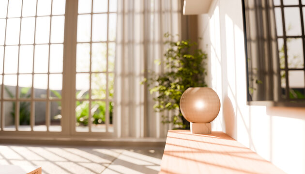 Sunlit modern living room interior with a lamp and window