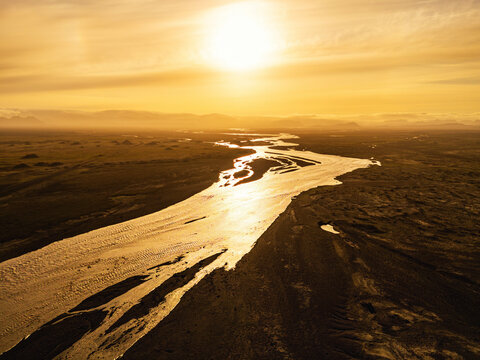 Aerial view of a braided river at sunset in M�rdalssandur Iceland